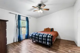 Master Bedroom with ceiling fan.