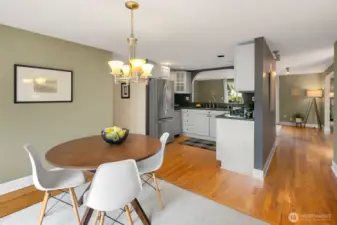 Updated kitchen with granite counters, stainless appliances with an abundance of cabintes.