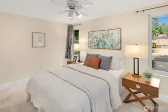Primary bedroom with ensuite bath and California Closet built-ins.