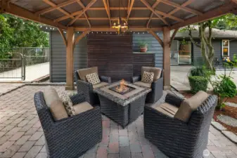 Gazebo built in 2016, chairs and gas fireplace will remain for buyers if interested.