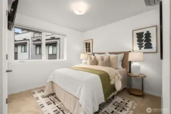 Another of the 3 bedrooms- this one comes with its own tv!
