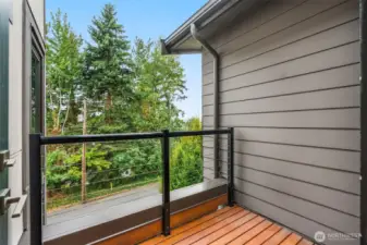 Covered deck with peekaboo views of the Lake- staircase to the right of the photo, leads you to the rooftop deck