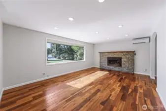 Entry living room with propane fireplace insert