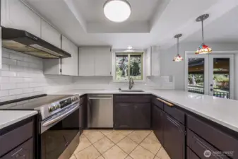 Kirchen with new counters, sink and tile flooring