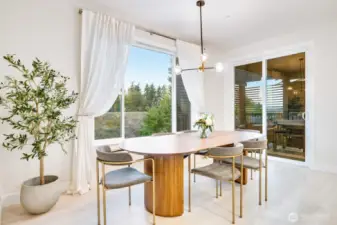 Formal dining with immediate access to the covered privacy deck.