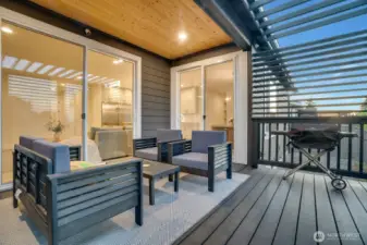 Notice sliding doors through both the dining and living room.