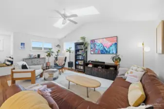 Vaulted ceilings and sky lights make this room feel open and bright