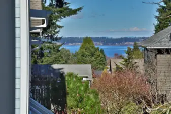 There are views of the water and mountains from the covered front porch and living room!