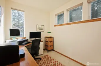 Main level office or studio space...Whidbey Telecom high speed “Big Gig” Internet would transfer to buyer — $75 per month fixed cost. Won’t ever increase.  Seller is open to leaving the desk unit that fits perfectly!