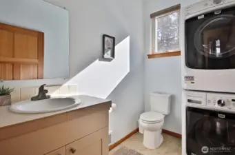 Half-bath installed at time of construction with its own grinder pump —$15,000 or more added value with laundry upstairs!