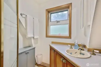 Main Home. Split bathroom. Shower and sink.