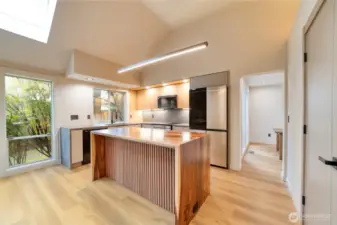 Masterfully remodeled gourmet kitchen with top-of-the-line appliances.