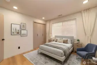 Lower level fourth bedroom (virtually staged).