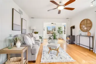 Inside, fresh interior paint and warm fir floors set a comfortable, updated tone.