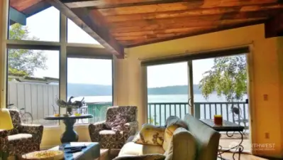 Tall windows in main Living area opens to deck overlooking Lake Sammamish.