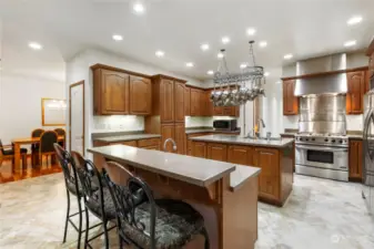Gourmet Kitchen with all Stainless-Steel Appliances throughout, Capital Performance Commercial Series PSGR364G features a 36” Gas Cooking Surface with 4 sealed burners and griddle, a Gas Oven, with Gas Convection and Gas Infrared Broiler.