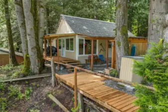 WELCOME TO "the BUNKHOUSE" ~ 468SQ FT w/river view deck and covered entertainment.