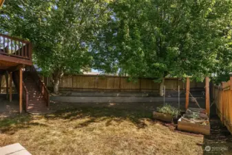 Back fence is terraced as well as side yard with a great place to add landscaping.