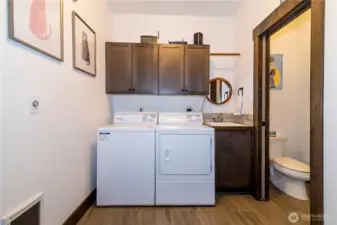 Nice size laundry room and 1/4 bath off of the 3 car garage.