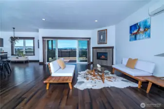 The living room flows seamlessly into the kitchen and breakfast nook, creating the perfect space for entertaining and family activities.