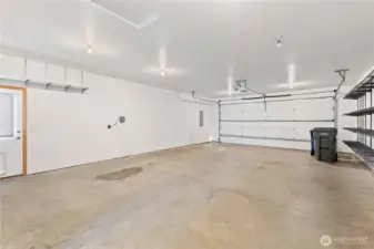 HUGE garage!  Lots of built in shelving.  Room for toys, workshop, etc.