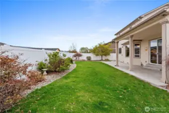Fully fenced yard.  Mature landscaping.