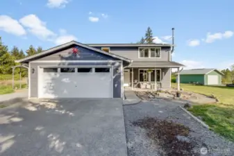 Shop shown at right included and has it's own driveway.