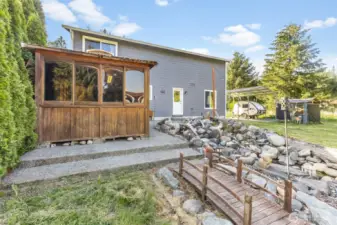 Such a fun backyard. Includes a covered area to put a grill etc.