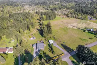 A wooded area at the back of the property allows camping and adventure without going anywhere.