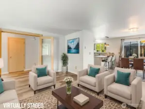 Open living/entertainment area virtually staged for decorating idea.