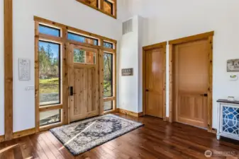 Front door is solid Knotty alder wood from a private PNW Mill