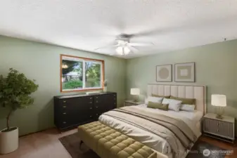 Primary suite is virtually staged here to show some furniture options. May not be to scale.