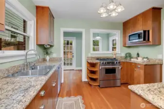 Updated kitchen features an eat-in nook and wall of pantry space