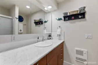 3/4 bath right outside the kitchen sitting area