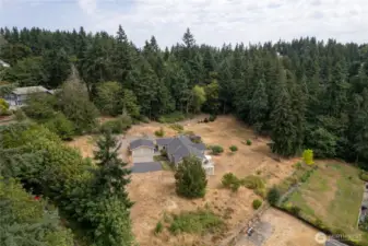 The house is strategically placed on the lot that you could add multiple homes if you wanted to split the parcel up