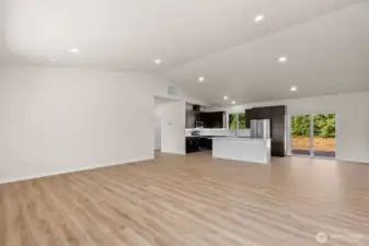 View from entry, with vaulted ceilings.