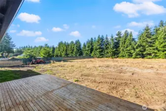 Deck off dining area, with large backyard!