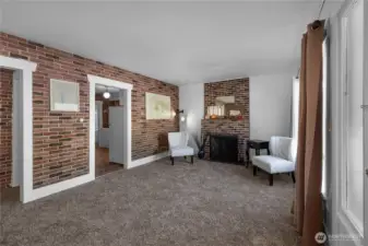 Welcome in to the living room complete with new carpet and fresh interior paint