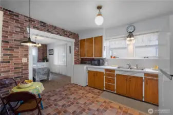 Kitchen with room for a small dining table.