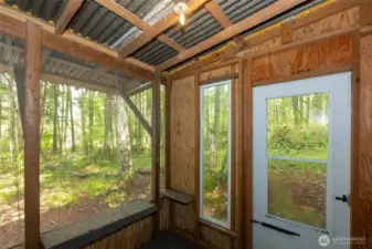 Screened patio off guest house