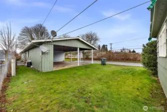 Space between the duplex's carport and the small 702 sqft home.  Zoned MXD non-conforming so either remodel the house or demo it and add a commercial component - Lots of choices on the small house - Looking for a fixer?  This is it!