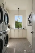 A versatile bonus room with vaulted ceilings, ideal as a media lounge, playroom, fitness space, or additional gathering area.