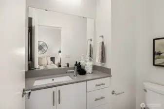 Lovely quartz counter top in the Primary bath.