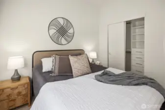 The second bedroom has a custom closet system as well.