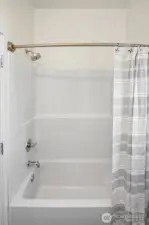 Shower and tub in second bath.
