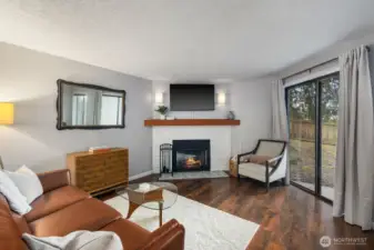 Living room with wood burning fireplace