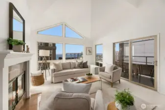 Vaulted ceilings add to the open feeling of this top floor unit.  Watch the grain elevators in action through your living room window!