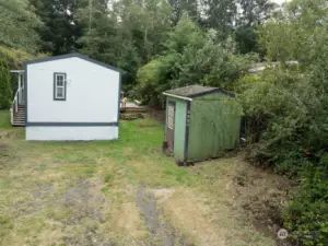 North Side/Driveway with Outside Shed