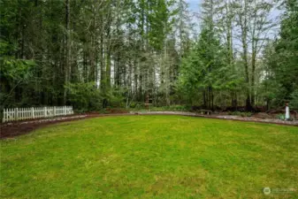 This would be a great place for a playfield, play structures or a pickleball court or volleyball net.   Plant raised garden beds or just enjoy the beautiful green lawn.