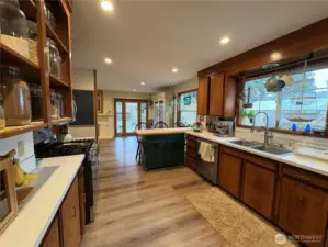 The kitchen features a spacious galley layout, providing plenty of room for multiple people to cook and move around comfortably.